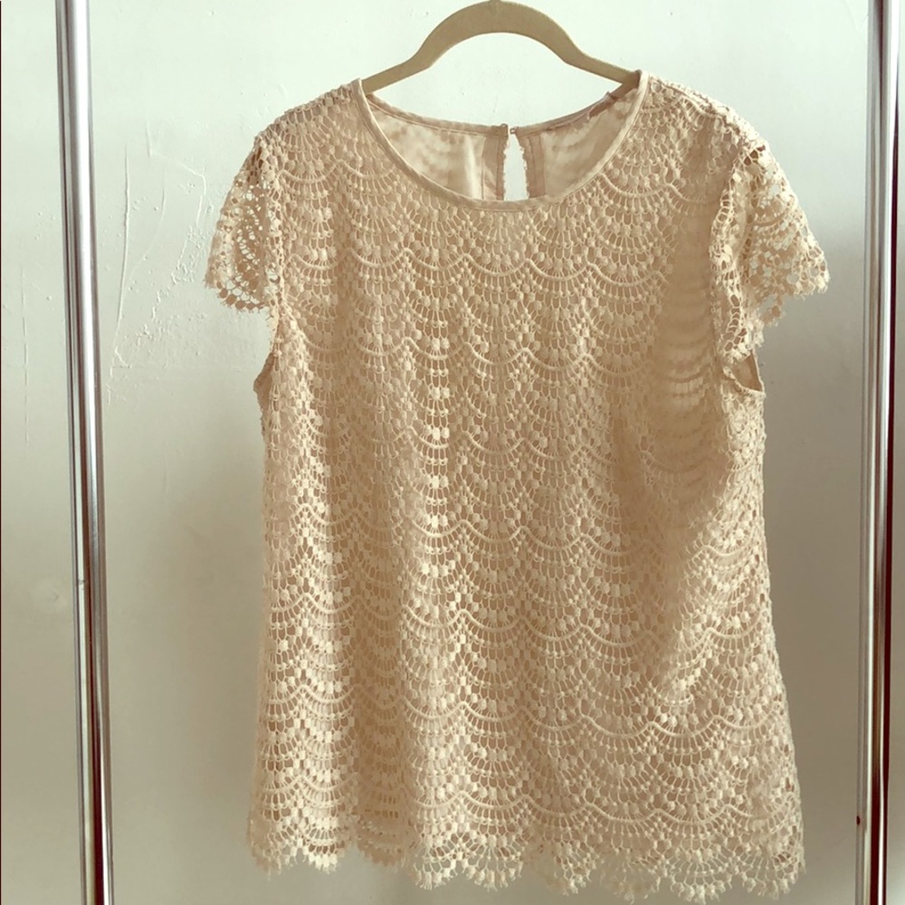 Cream blouse with with intricate details